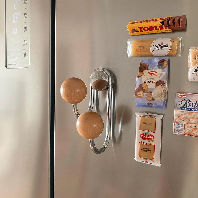 Eames Dot Magnetic Hooks in silver red and black iron with wood accents 8×7.5×16 cm mounted on metal surface holding keys