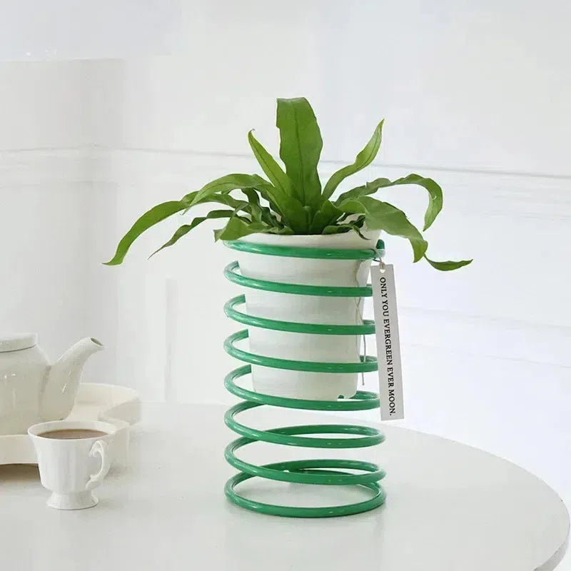 wire plant pot holders Spring Wire Planter Stand: Elegant Stainless Steel Holder for Plants