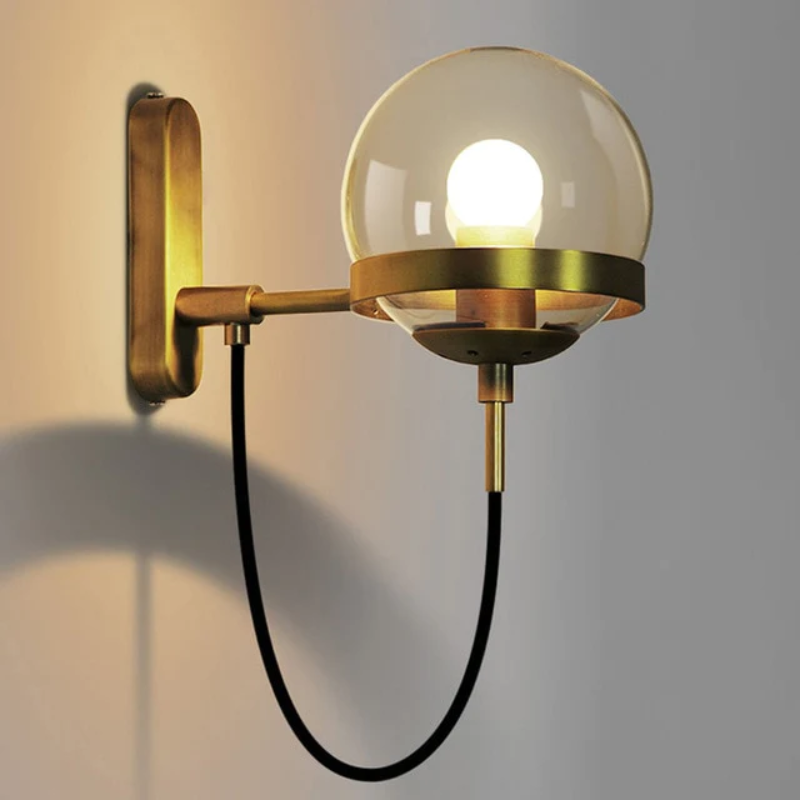 Stella Wall Sconce With Stand black metal ring holding tinted glass globe mounted on backplate 6in shade 30in cord