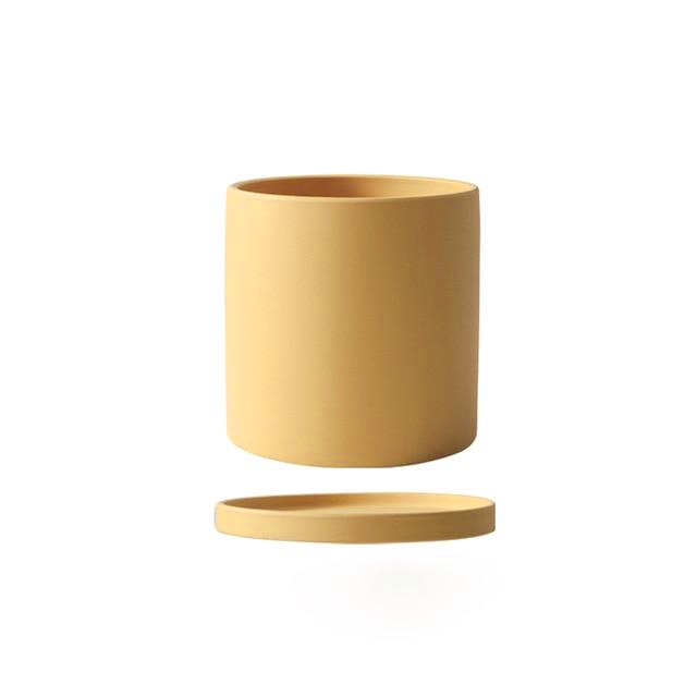 yellow ceramic Planter cylinder shape