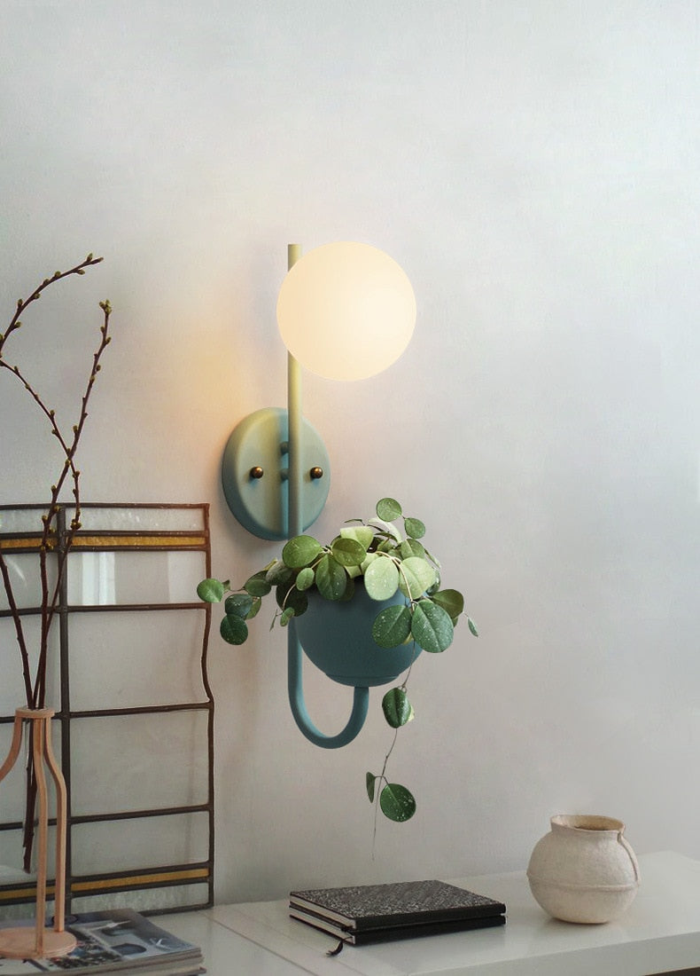 vertical abstract iron blue frosted glass with plant container wall lamp