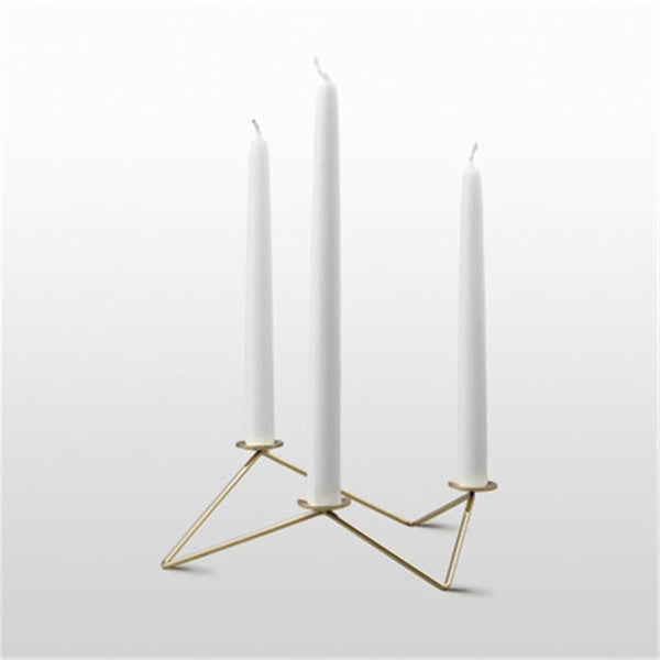Metal candle holder for three candles