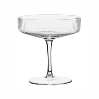 round textured champagne and cocktail glass