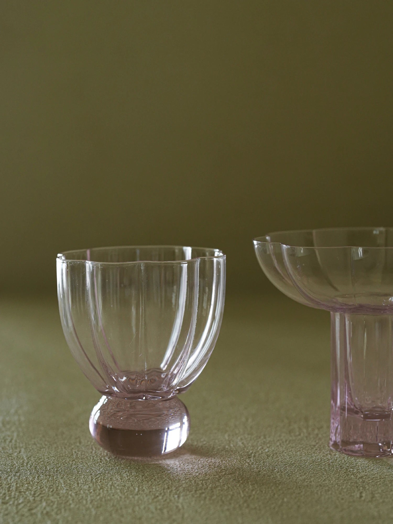 pink fluted tall cocktail glass and wine goblet