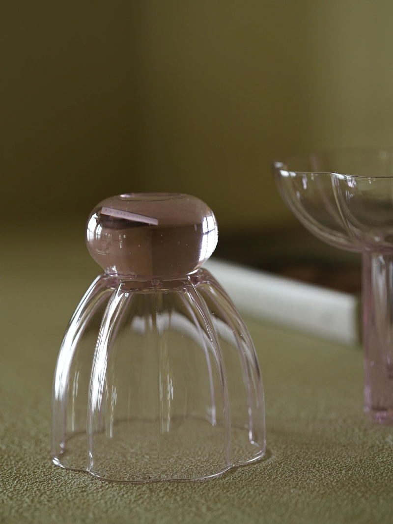 pink fluted tall cocktail glass and wine goblet