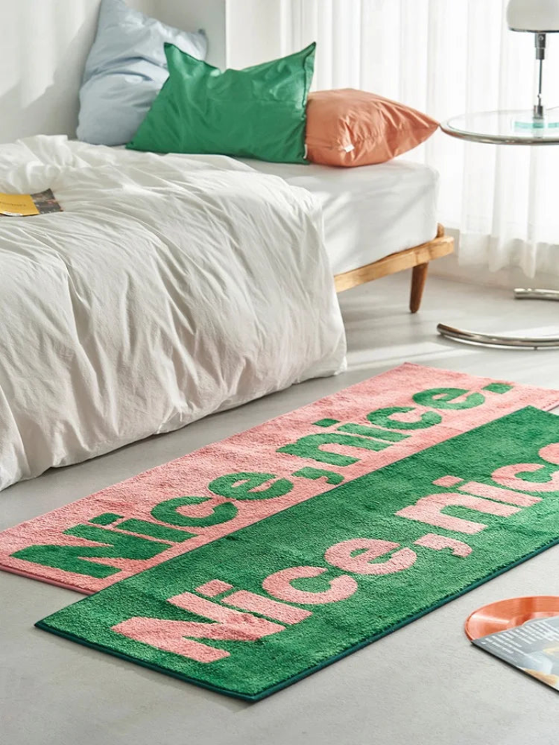 statement graphic tufted bath mat and runner rug in contrast colors