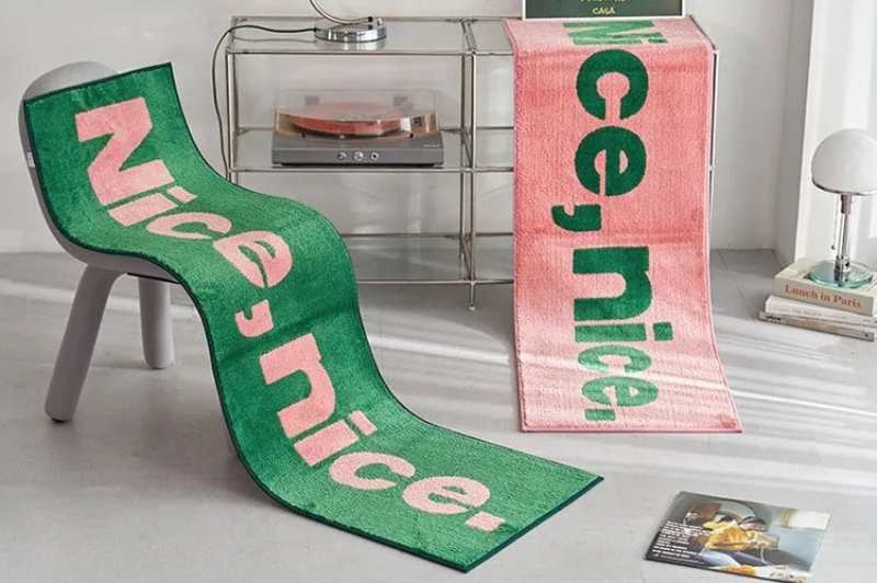 statement graphic tufted bath mat and runner rug in contrast colors