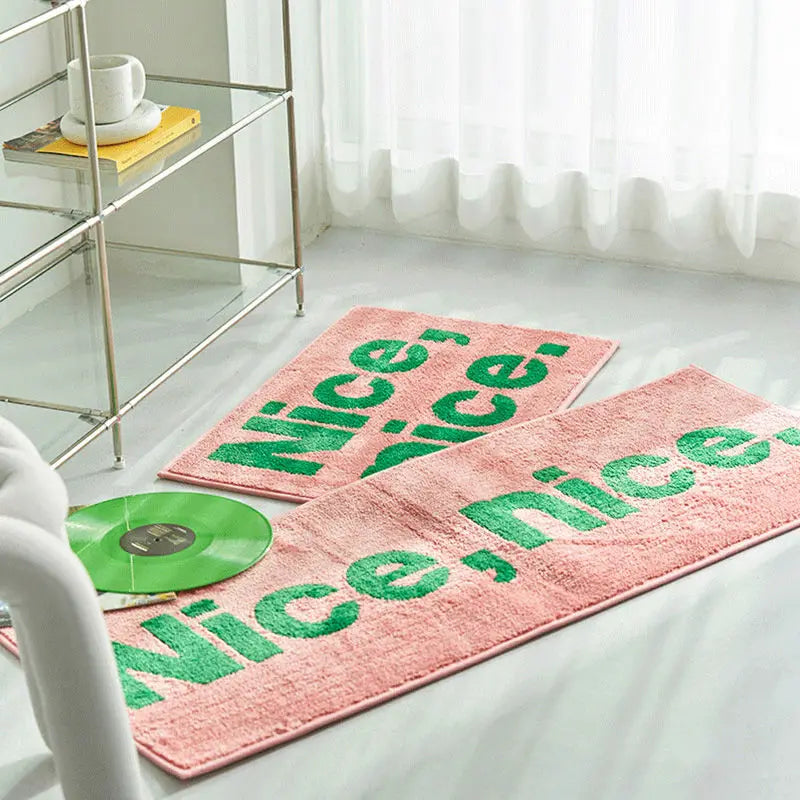 statement graphic tufted bath mat and runner rug in contrast colors