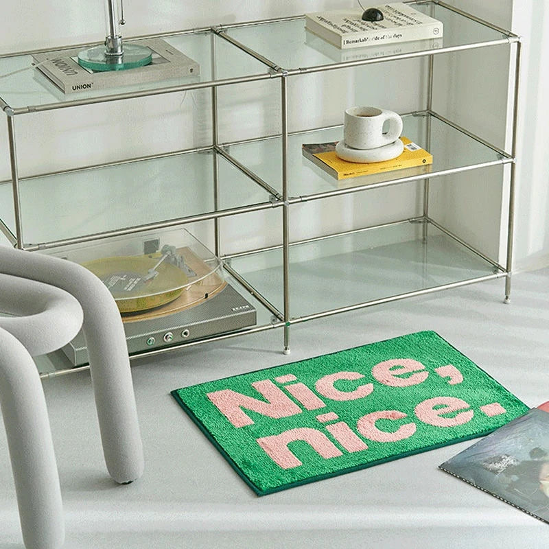 statement graphic tufted bath mat and runner rug in contrast colors