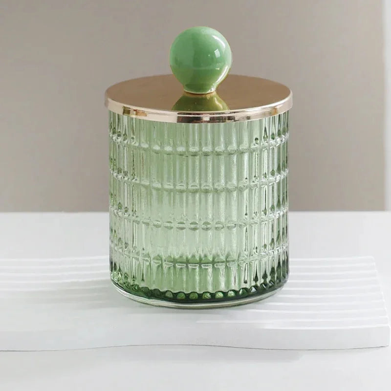 Textured glass canister with colorful knob and metal lid storage jar