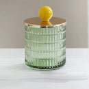Textured glass canister with colorful knob and metal lid storage jar