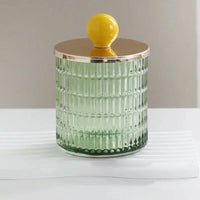 Textured glass canister with colorful knob and metal lid storage jar
