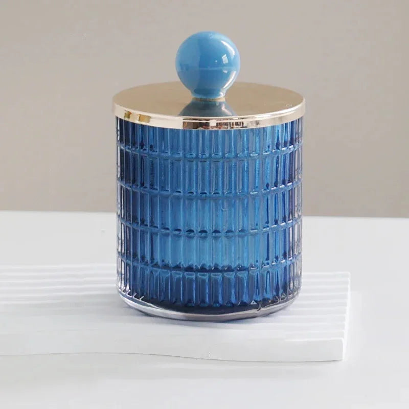 Textured glass canister with colorful knob and metal lid storage jar