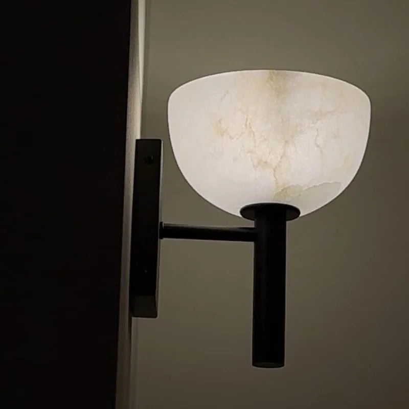 Modern wall light with marbled glass shade black and gold ambient lighting fixture