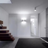 The Dichotomy Wall Light Modern wall light metal chrome black gold white dual glow contemporary lighting