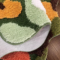 Irregular green landscape tufted area rug with moss texture multicolor abstract design