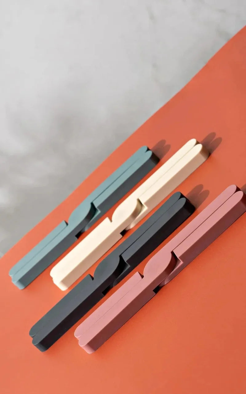 Foldable silicone heat resistant Crossfold Coaster Trivet, non-slip pot pan mat and coaster set in modern multi-color shades for kitchen table protection