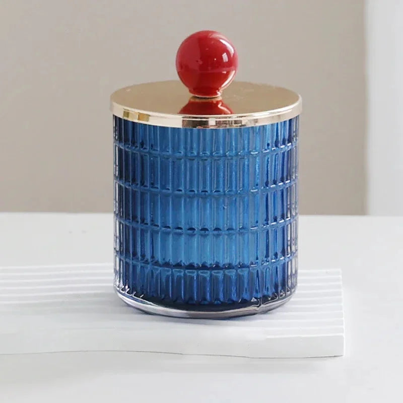 Textured glass canister with colorful knob and metal lid storage jar