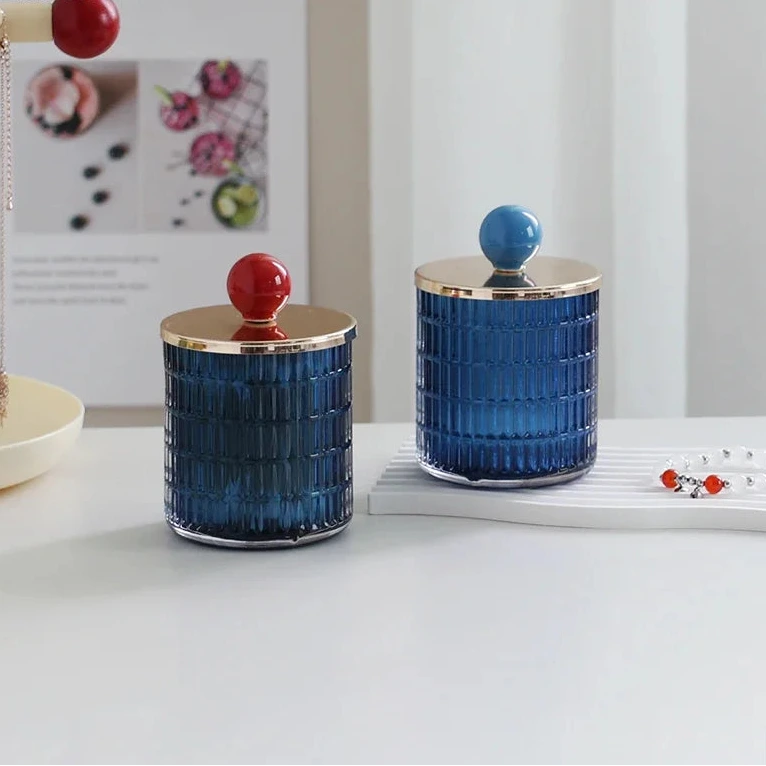 Textured glass canister with colorful knob and metal lid storage jar