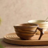 Ceramic ridged coffee mug warm brown textured tea cup sculptural handle minimalist drinkware