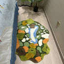 Irregular green landscape tufted area rug with moss texture multicolor abstract design