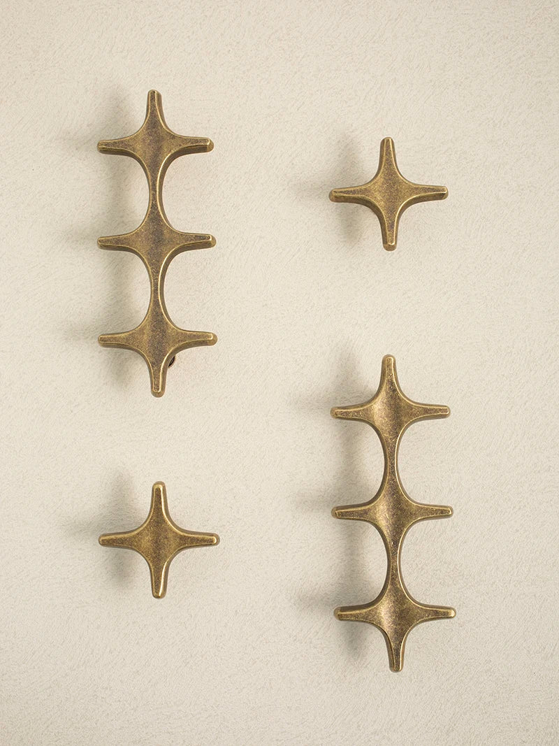 The Crossbeam Brass Knobs Antique brass star-shaped cabinet knobs 1-star and 3-star Nordic hardware