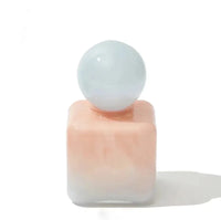 Pastel colored glass bud vase sealed lid sculptural aromatherapy flower diffuser container