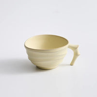 Ceramic ridged coffee mug warm brown textured tea cup sculptural handle minimalist drinkware