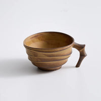 Ceramic ridged coffee mug warm brown textured tea cup sculptural handle minimalist drinkware