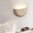 stone textured basin wall light sculptural wall sconce warm ambient lighting modern minimalist wall lamp