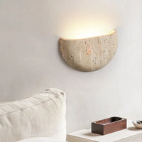 stone textured basin wall light sculptural wall sconce warm ambient lighting modern minimalist wall lamp