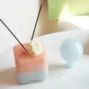 Pastel colored glass bud vase sealed lid sculptural aromatherapy flower diffuser container