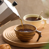 Ceramic ridged coffee mug warm brown textured tea cup sculptural handle minimalist drinkware