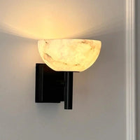 Modern wall light with marbled glass shade black and gold ambient lighting fixture