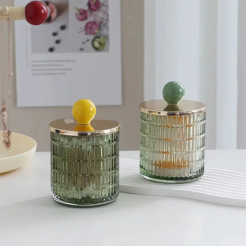 Textured glass canister with colorful knob and metal lid storage jar