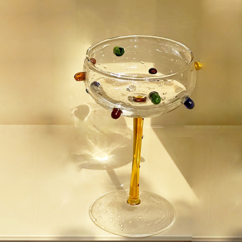 Champagne coupe with multicolor dot creative cocktail glass