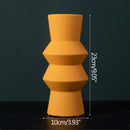 sculptured cylinder orange ceramic vase