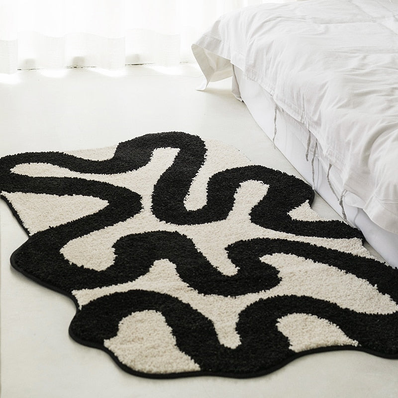 Black Swirl Shaped Area Rug