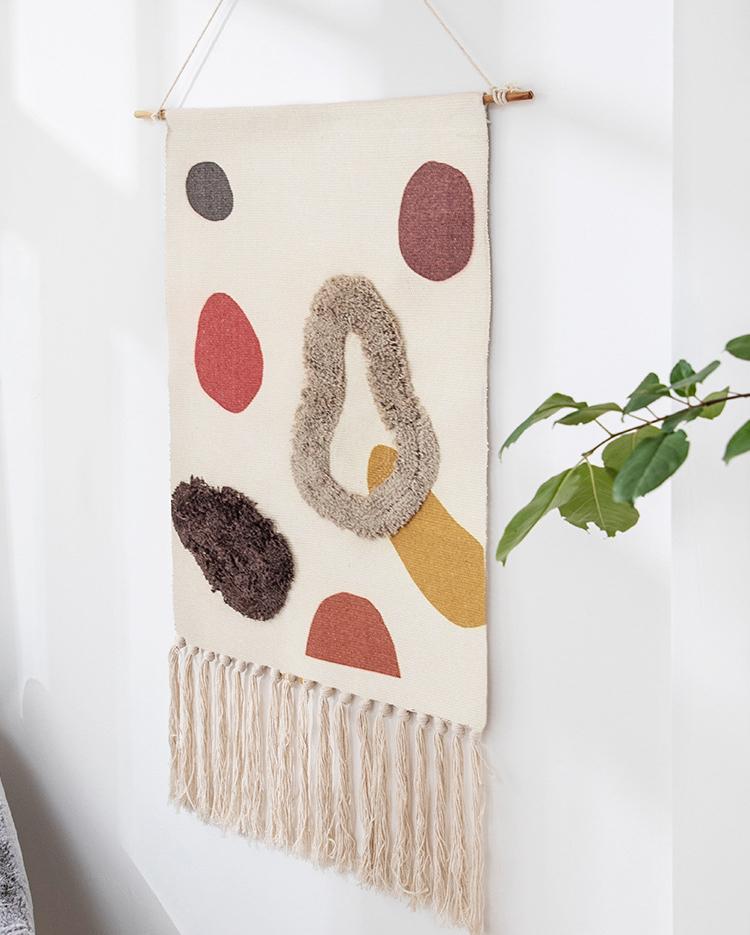 Wall Hanging tapestry with geometric designs, made of Woven cotton with tassel fringe and wooden hanging dowel