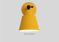 Rotating Wall Sconce in Wood and Metal yellow