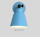 Rotating Wall Sconce in Wood and Metal blue