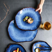 abstract rough edges cat-eye pattern blue glazed ceramic plate
