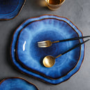 abstract rough edges cat-eye pattern blue glazed ceramic plate