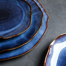 abstract rough edges cat-eye pattern blue glazed ceramic plate