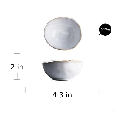 round abstract gold trim edges white ceramic bowl