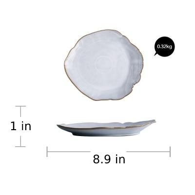 round abstract gold trim edges white ceramic plate