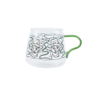 rounded clear glass van gogh-design mug with green handle