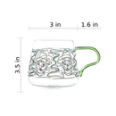 rounded clear glass van gogh-design mug with orange green handle