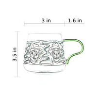 rounded clear glass van gogh-design mug with orange green handle