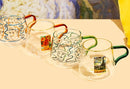 rounded clear glass van gogh-design mug with orange green handle